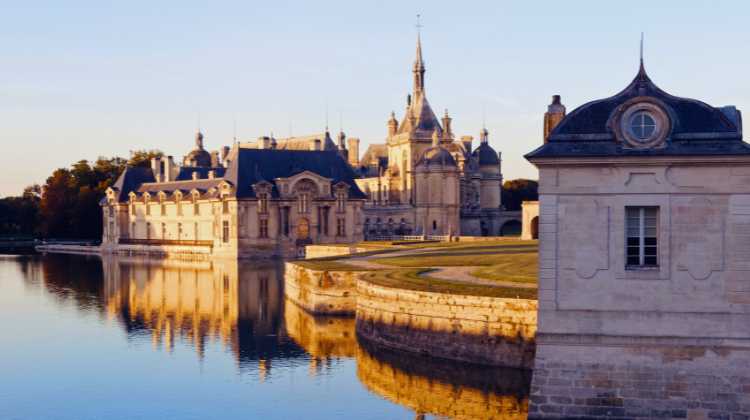 The Chantilly Castle pictured here is a highlight of any day trip from Paris by train.