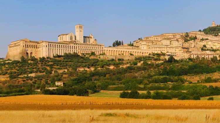 The Basilica of Saint Francis of Assisi is shown here in the fairytale hill town of Assisi, an easy day trip by train from Rome.