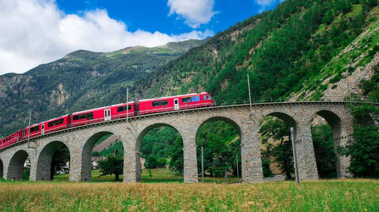 Going to Rome from Paris via Switzerland gives you the chance to experience the Bernina Express, shown here.