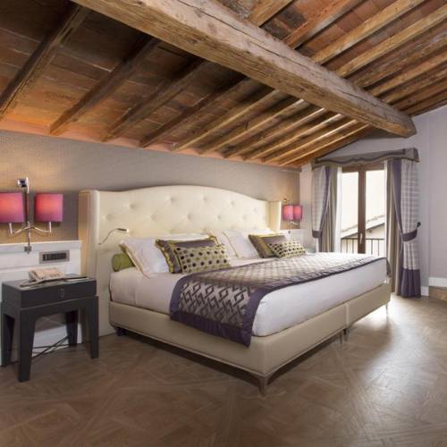 When arriving from Paris to Florence by train, consider staying at a hotel in the city center.